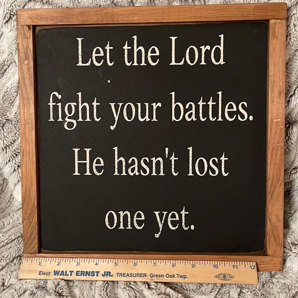 Rustic wall plaque “Let the Lord fight your battles, He hasn’t lost one yet.”